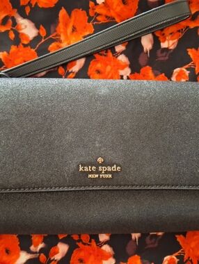 kate spade black Glittery Wristlet wallet with gold logo
